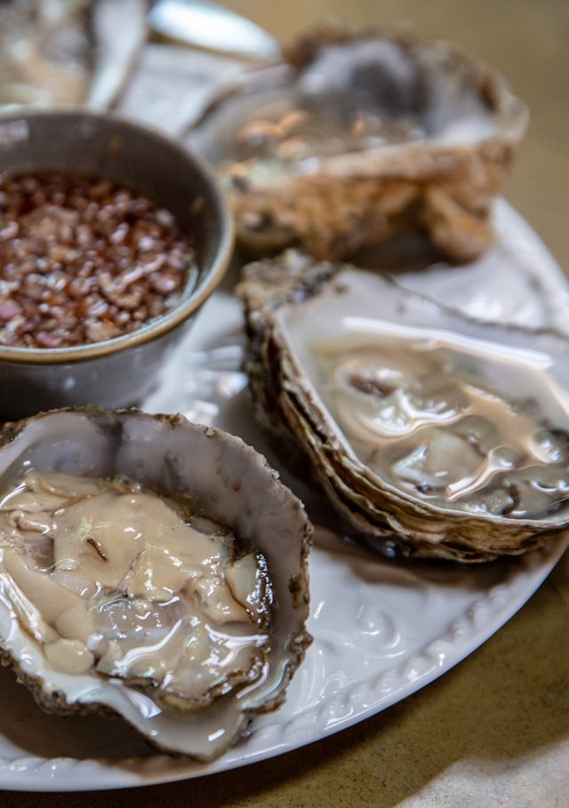 Rock oysters served with a cabernet sauvignon shallot dressing. Craft beer pub, Sussex.